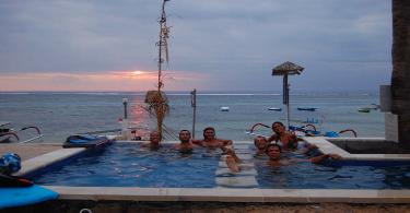 Friends having fun in the pool at Mainski, Nusa Lembongan accommodation, Bali.