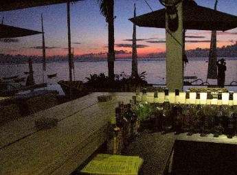 Mainski. Nusa Lembongan Resort. bar at sunset