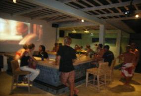 Mainski Nusa Lembongan Resort Hotel new Poolside bar showing music DVDs.